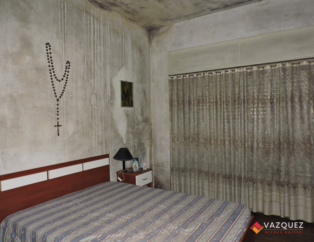 Lote con Casa a Reciclar